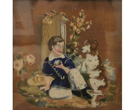 A Victorian tapestry of a boy and dog, housed in a maple frame and glazed. 36.5 x 36.5 cm overall.