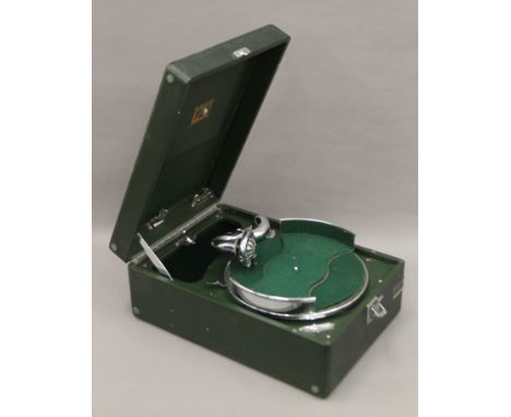 A vintage HMV travelling gramophone. 41 cm long.