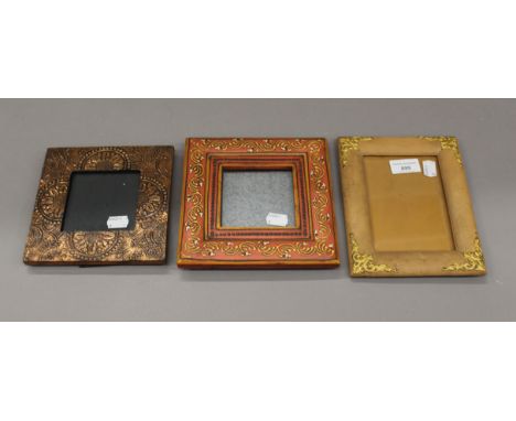 Three small vintage photograph frames. The largest 15.5 x 19 cm.