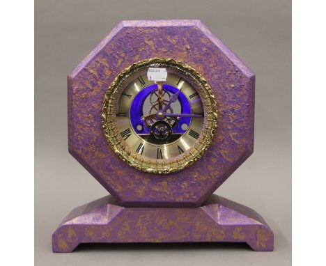 A late 19th/early 20th century purple and gold painted mantle clock with later movement. 31 cm high.