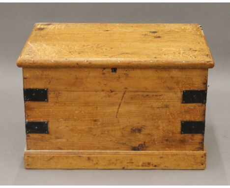 A Victorian pine trunk. 62 cm long.