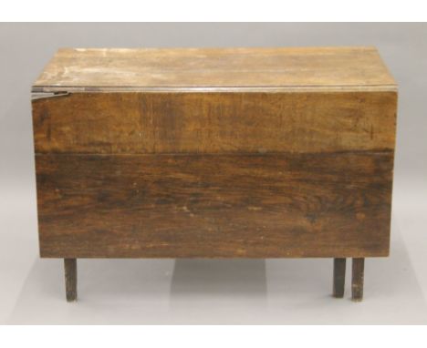 A 19th century oak gate leg table. 104 cm long.