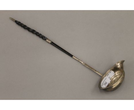 A Georgian baleen handled silver toddy ladle. 40 cm long.