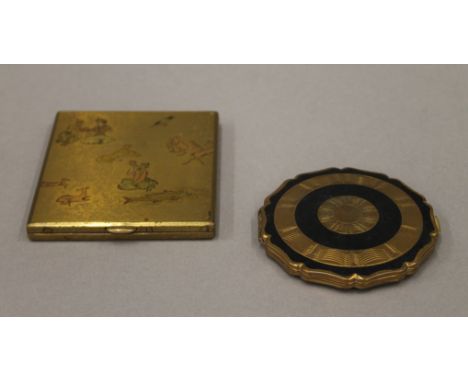 A vintage cigarette case and a vintage compact.