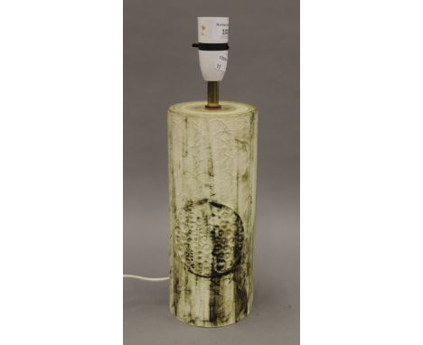 A Carn pottery lamp base with label. 34 cm high overall.