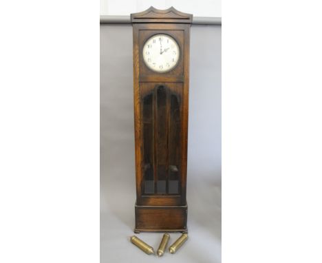 An early 20th century oak longcase clock. 202 cm high.