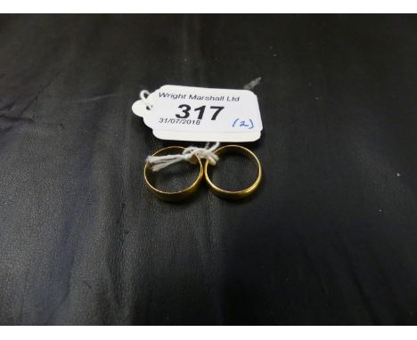 Two 22ct gold band rings, ring sizes K and K½, weight approx 6.8g