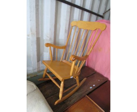 A modern stick back rocking chair 
