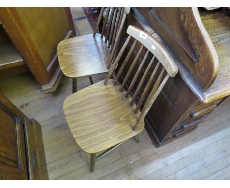 Four Ercol style stick back chairs 