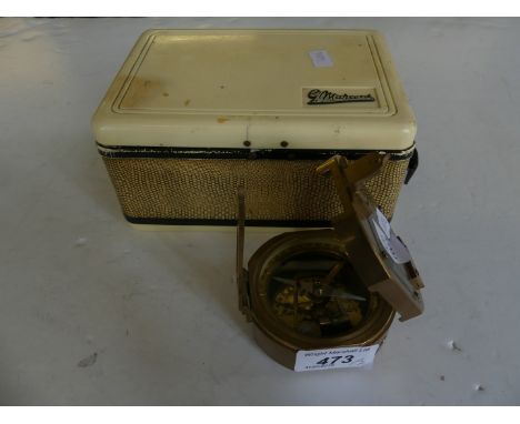 A Marconi portable radio together with a Stanley brass compass.