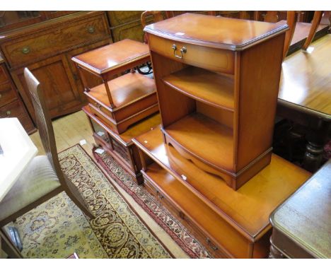 A reproduction yew wood veneered side cabinet, two tier side table, two tier lamp and an entertainment storage cabinet.