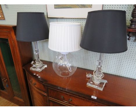 A pair good quality reproduction glass effect table lamps, together with a further glass table lamp of bulbous form (sold ele