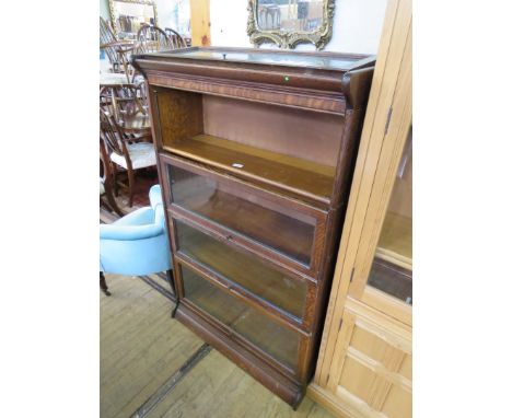 A Globe Wernicke style four tier stacking barristers bookcase