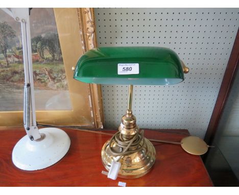 A reproduction desk lamp with rotating green glass shade 