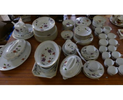 A large collection of Royal Worcester Astley pattern dinner wares.