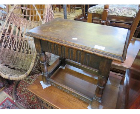 A Georgian medium oak bureau, the fall front enclosing fitted compartments above four drawers raised on bracket supports.
