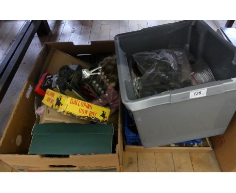 Four boxes of assorted mixed toys to include various plastic toy soldiers, tin plate galloping cowboy, vintage robot figure, 