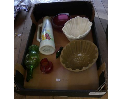 A mixed lot comprising two pottery jelly moulds, cranberry glass jug, bowl and a further green glass jug and a Radford Potter