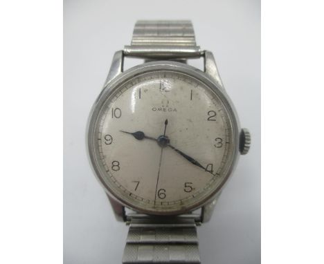 A WW2 Omega manual wind gents stainless steel wristwatch, circa 1943, possibly military. The dial having Arabic numerals with