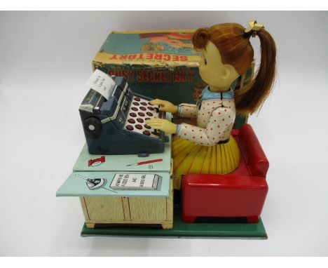 A Linemar Toys (made in Japan) tin plate, battery operated Busy Secretary with light moving typewriter with original box