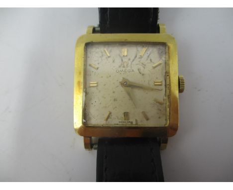 An Omega 18ct gold gents manual wind triple signed wristwatch, c. 1958. The 17 jewel calibre 511 movement numbered 16135935, 