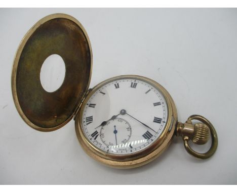 An early 20th century half hunter gold plated, keyless wind pocket watch having a white enamel dial with Roman numerals and s
