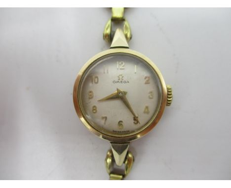 An Omega manual wind, gold plated ladies wristwatch, circa 1956 having a white dial with Arabic numerals, the calibre 244 mov