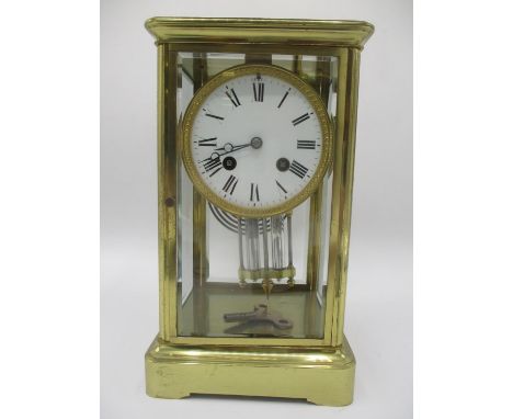 A late 19th century French 8 day brass mantle clock having a mercury pendulum, the movement signed A D Mougin, numbered 52/35