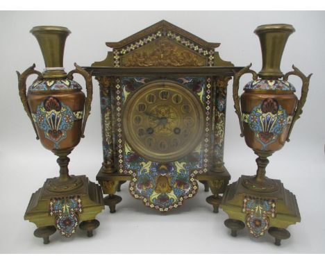 A late 19th century gilt metal cloisonne clock garniture set, the clock of architectural form having four Corinthian columns,
