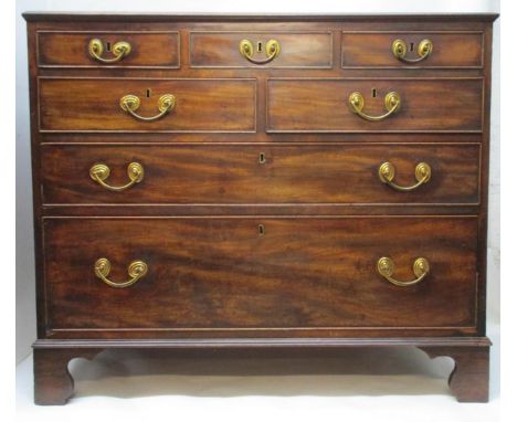 A George III mahogany chest of three short in line drawers, over two short and one long drawer, on bracket feet, 33" h, 39"w,