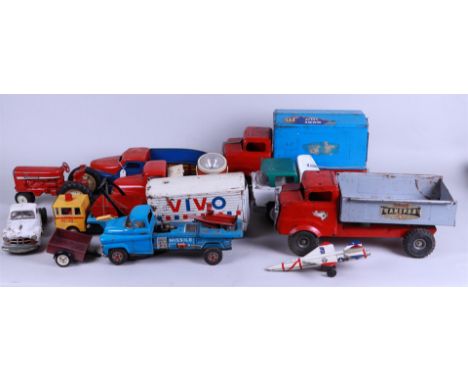 A large vintage tin toy cars.