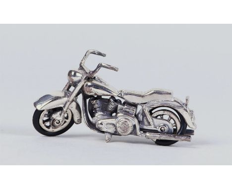 Miniature silver 'Harley Davidson' motorcycle marked with 1st grade sword, 925 and star 175 AR.Weight 46 grams7 x 3.5 cm