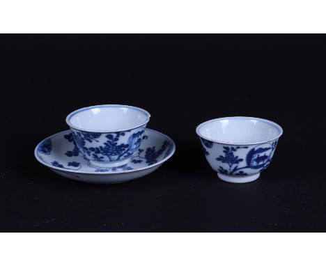 A lot consisting of two cups and a saucer. China, Kangxi.