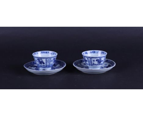 Two porcelain cups and saucers with compartments, and a playful decor. China, Kangxi/YongzhengDiam. 10.2 cm. h. 3.5 cm.