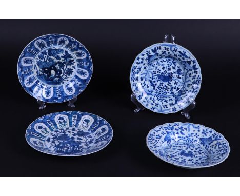 Two sets of two plates with floral and crab and perch decor. China, Kangxi.