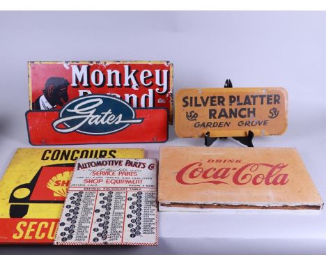 A lot of various vintage iron and cardboard partly advertising signs including Coca Cola.