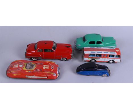 A lot of five vintage tin toy cars.