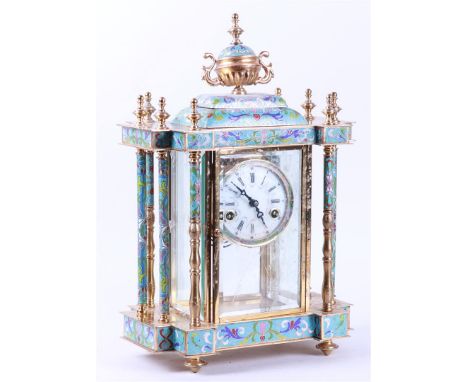 A cloisonné mantel clock with cut glass. The brass is in poor condition.