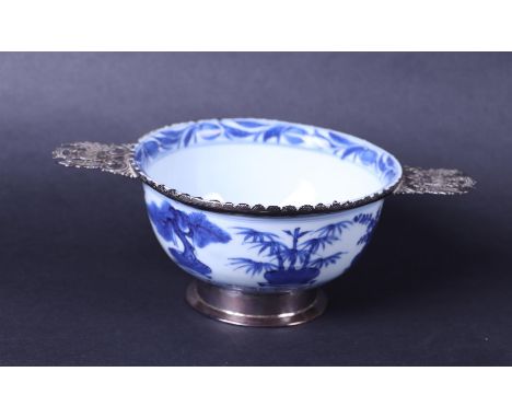 A porcelain bowl with floral decor, marked on the bottom. Made into a brandy bowl in a silver frame. China, Kangxi, silver 19