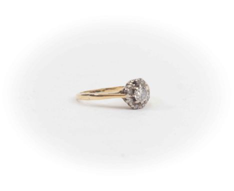 A Diamond cluster ring, central diamond weighing approx 0.25ct, with diamond surround, set in  18ct gold, size L, total gross