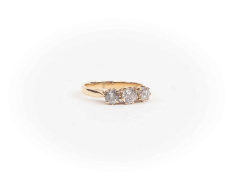 A diamond three stone gold ring, claw set with three diamonds with a total diamond weight approx 0.75 carat, size J1/2, total