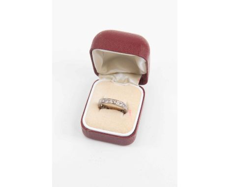 A diamond eternity ring, set in white metal, probably 18ct white gold, set with brilliant cut diamonds, size M 1/2, total gro