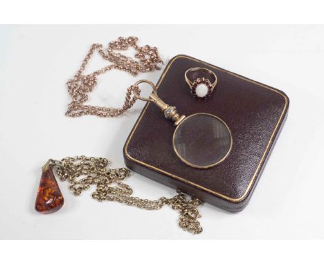 A Victorian turquoise set magnifying glass pendent and rolled gold belcher chain (unmarked) Baltic amber pendant with yellow 