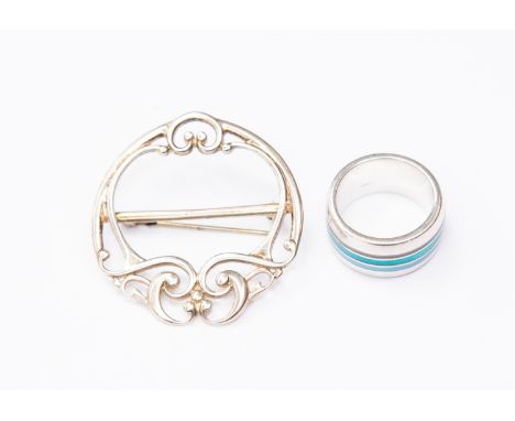 An Ola Gorie banded enamel silver band ring and a modern Celtic style brooch