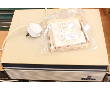 A Grundig reel to reel tape recorder, with two tapes (does work)