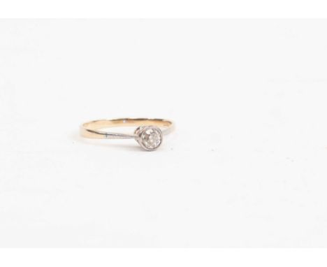 A diamond solitaire ring in 18ct gold, rub over set with an old cut diamond, weight approx 0.20 carat, O, total gross weight 