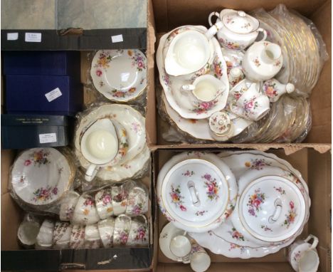 A large quantity of Royal Crown Derby posies, including dinner plates, wavy edge plates, tea cups and saucers, jugs, trinkets