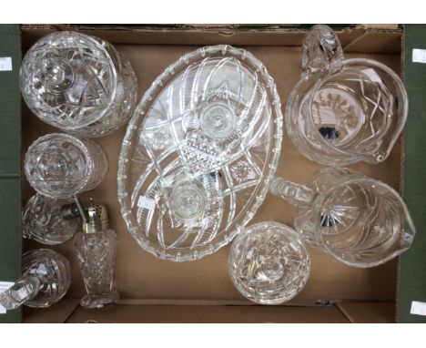 A collection of cut glass, jugs, jars and covers, candlesticks, ring box and cover and moulded glass oval tray (one box)