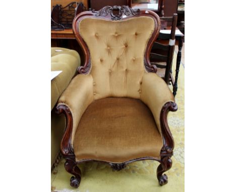 A Victorian mahogany button backed upholstered chair