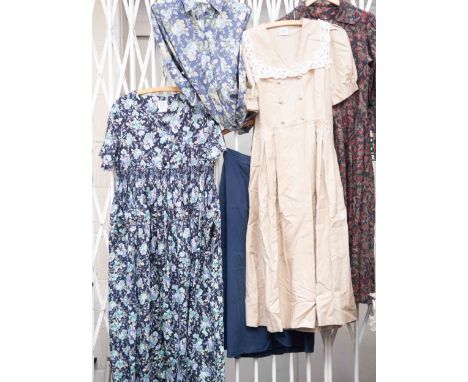 A collection of Laura Ashley including a long Maxi, floral printed dress, green mauves floral design on black, size 14, 1970,